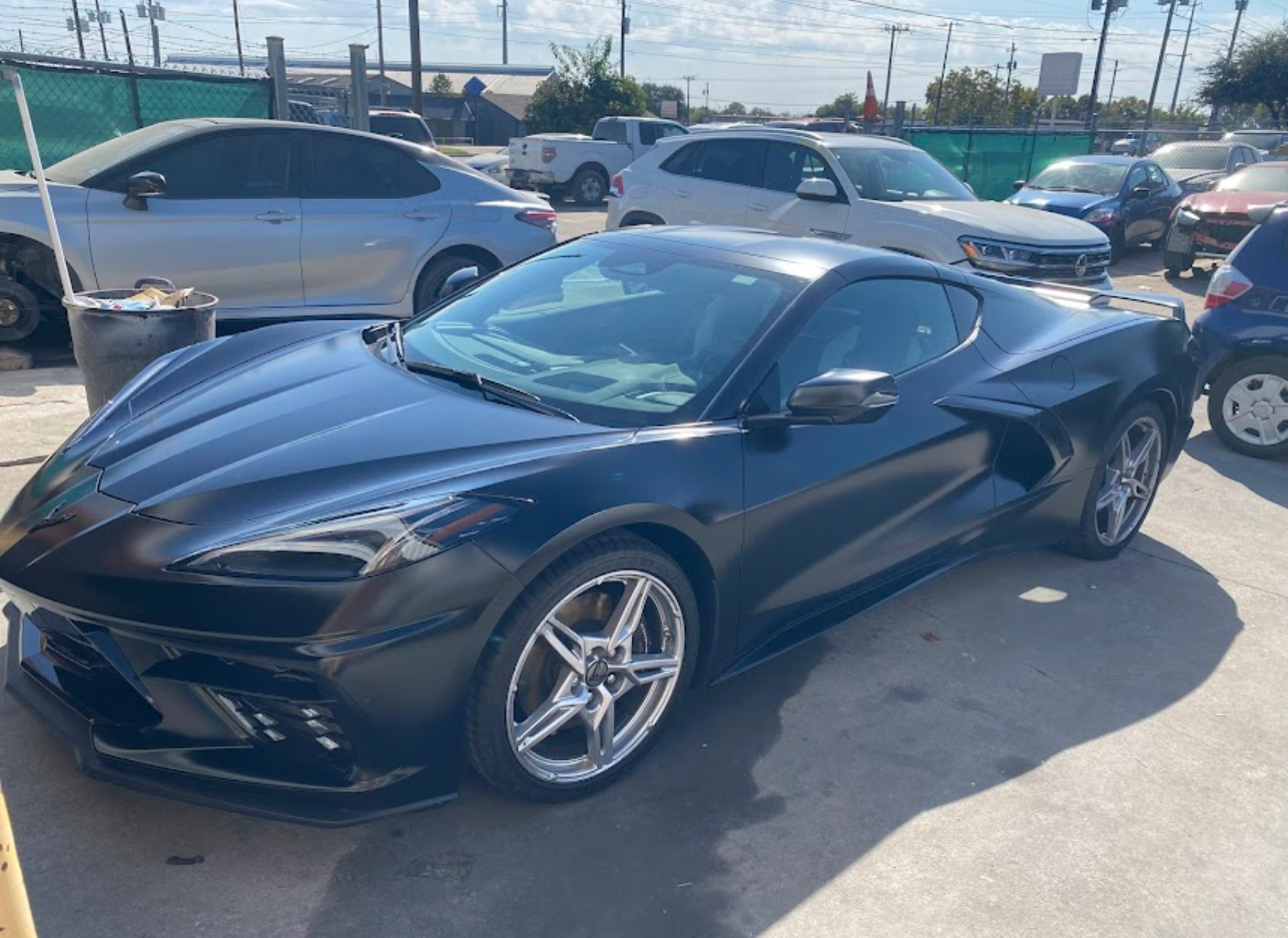 Satin black Corvette C8 after a full repaint at 8SRT Collision and Paint in Garland, TX